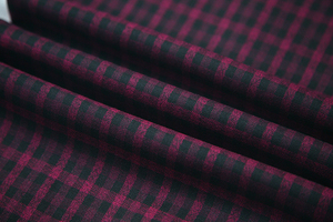 Red and black checked wool-like suiting fabric
