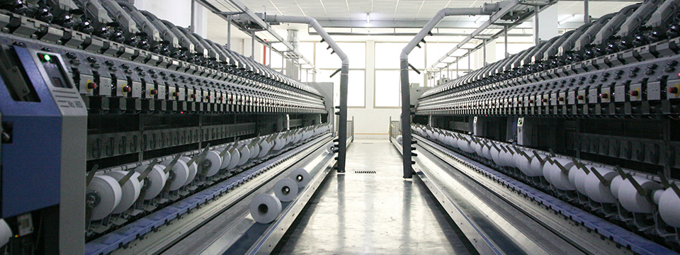 Rows of vortex spinning machines on the Zhengda group production floor